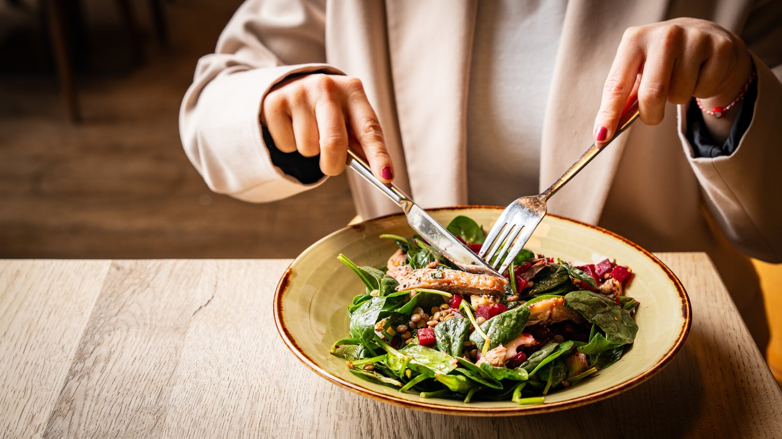 Fresh salad bowl with avocado, chicken, and greens at Zest Salad Bar South Woodford